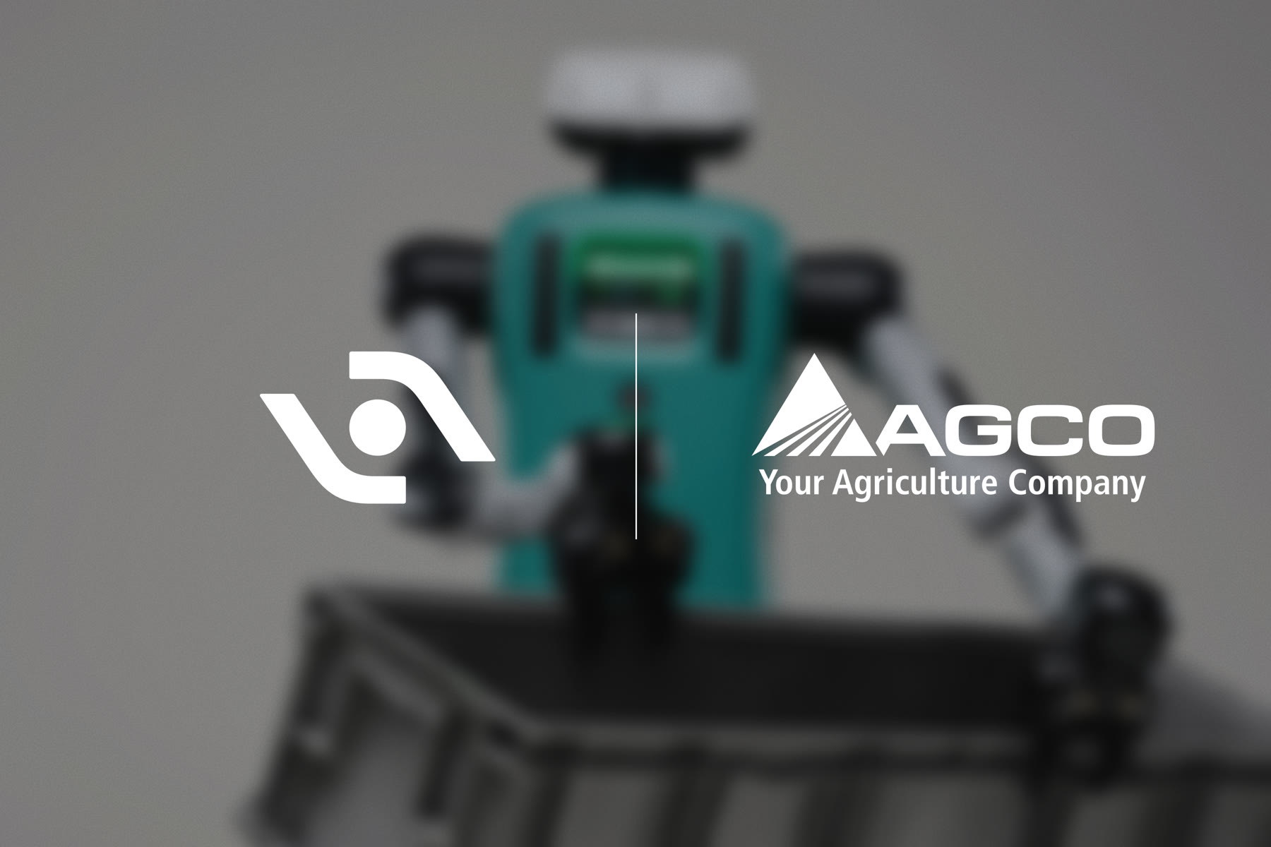 Blurred view of Agility Robotics' Digit humanoid head with Agility and AGCO logos overlaid on a dark background.