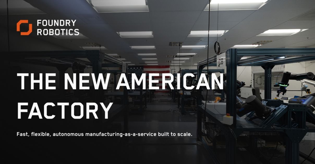 Foundry Robotics autonomous assembly workstations in a factory aisle with an American flag